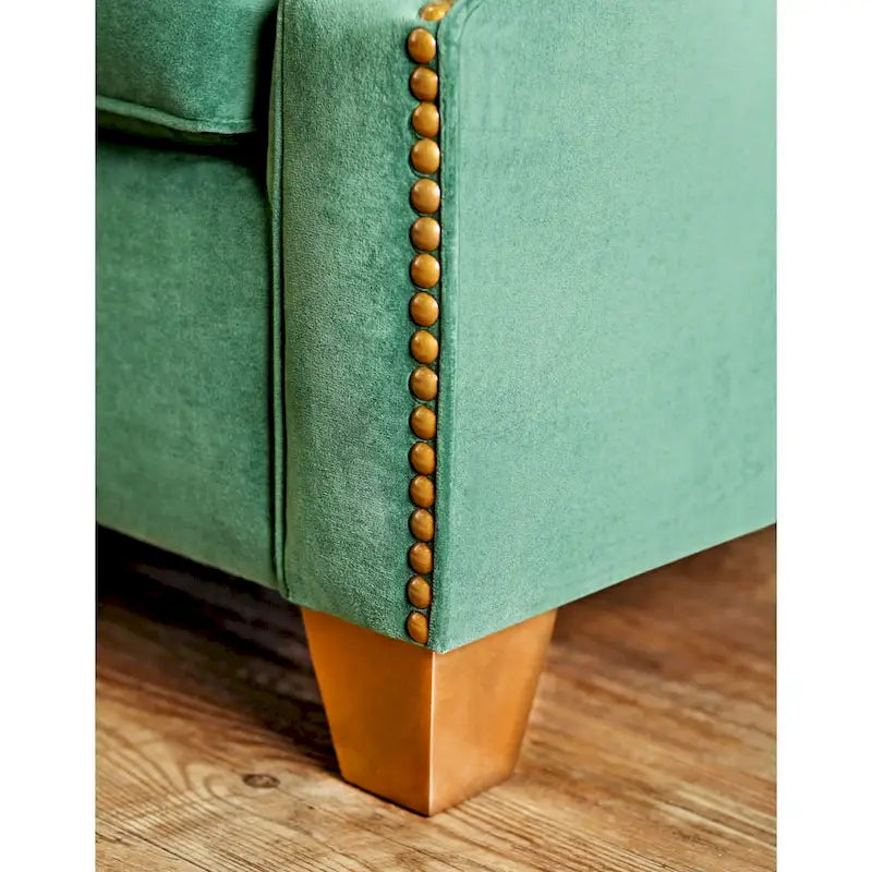 Canapé en microfibre vert émeraude avec bordure de clous dorés