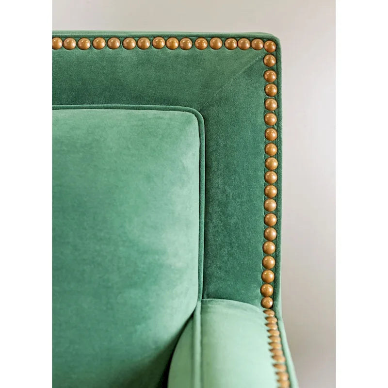 Canapé en microfibre vert émeraude avec bordure de clous dorés