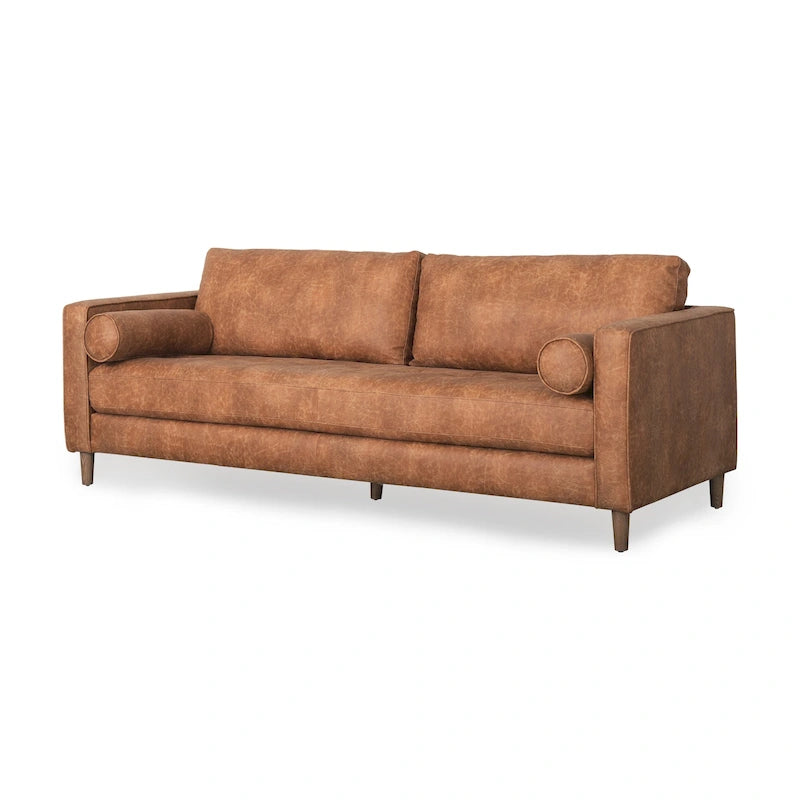 Dreisitzer-Sofa aus cognacbraunem Kunstleder mit Holzbeinen und Nackenrollen